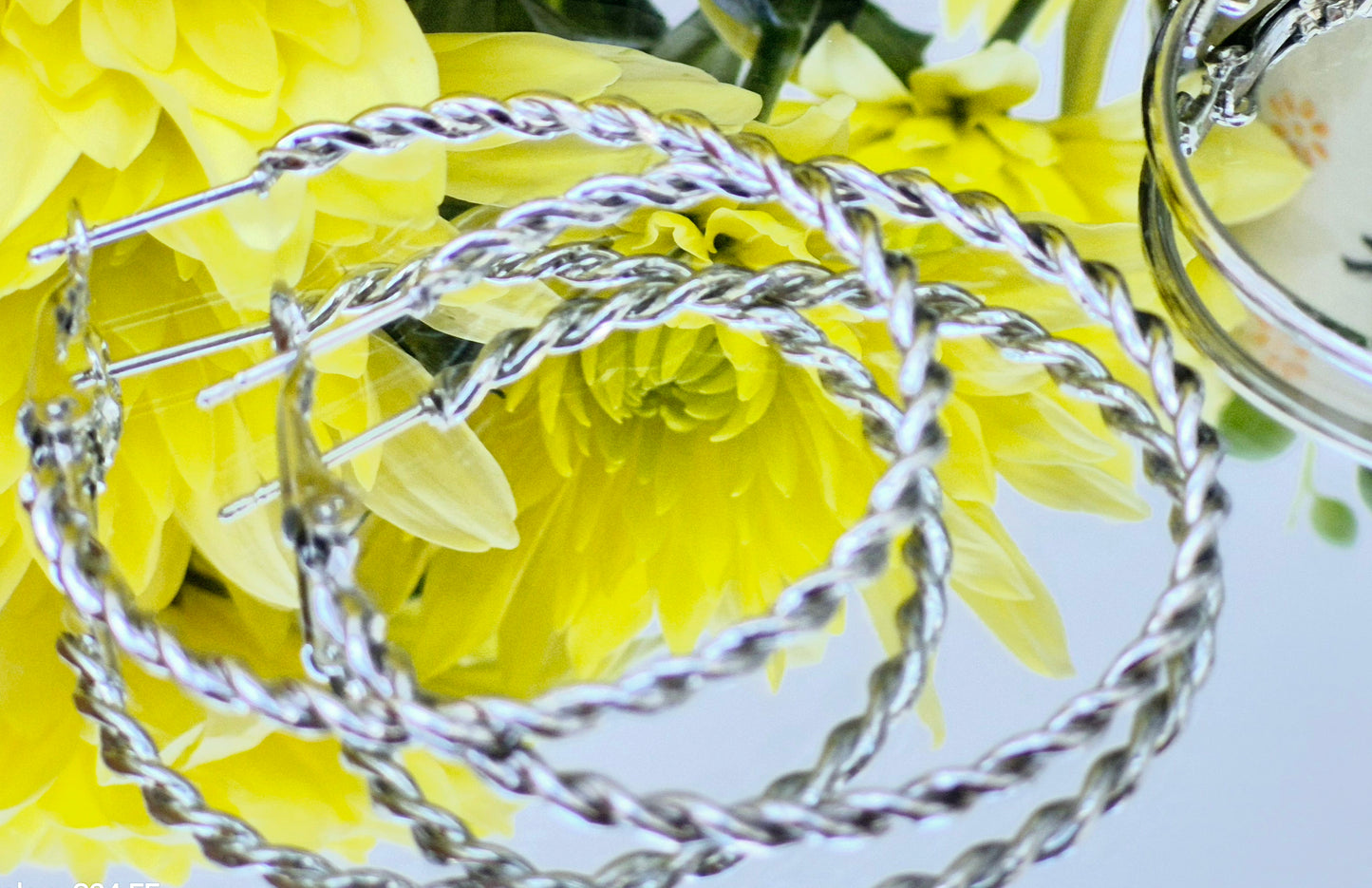 Silver Twisted Medium Hoop Earrings