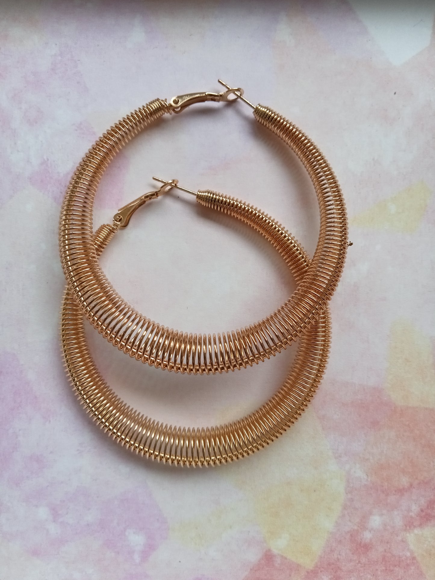 Gold Spring Tapered Hoop Earrings