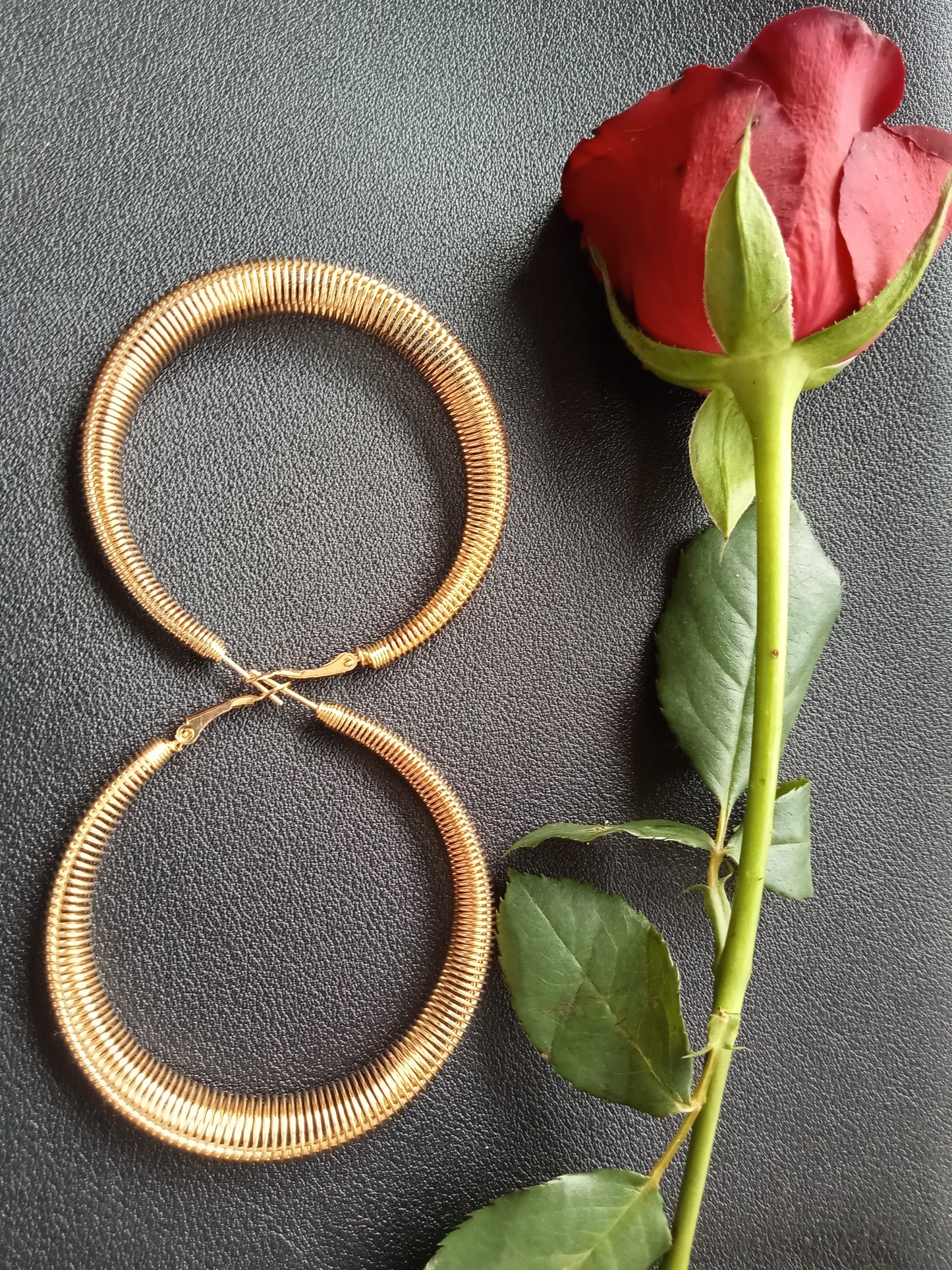 Gold Spring Tapered Hoop Earrings