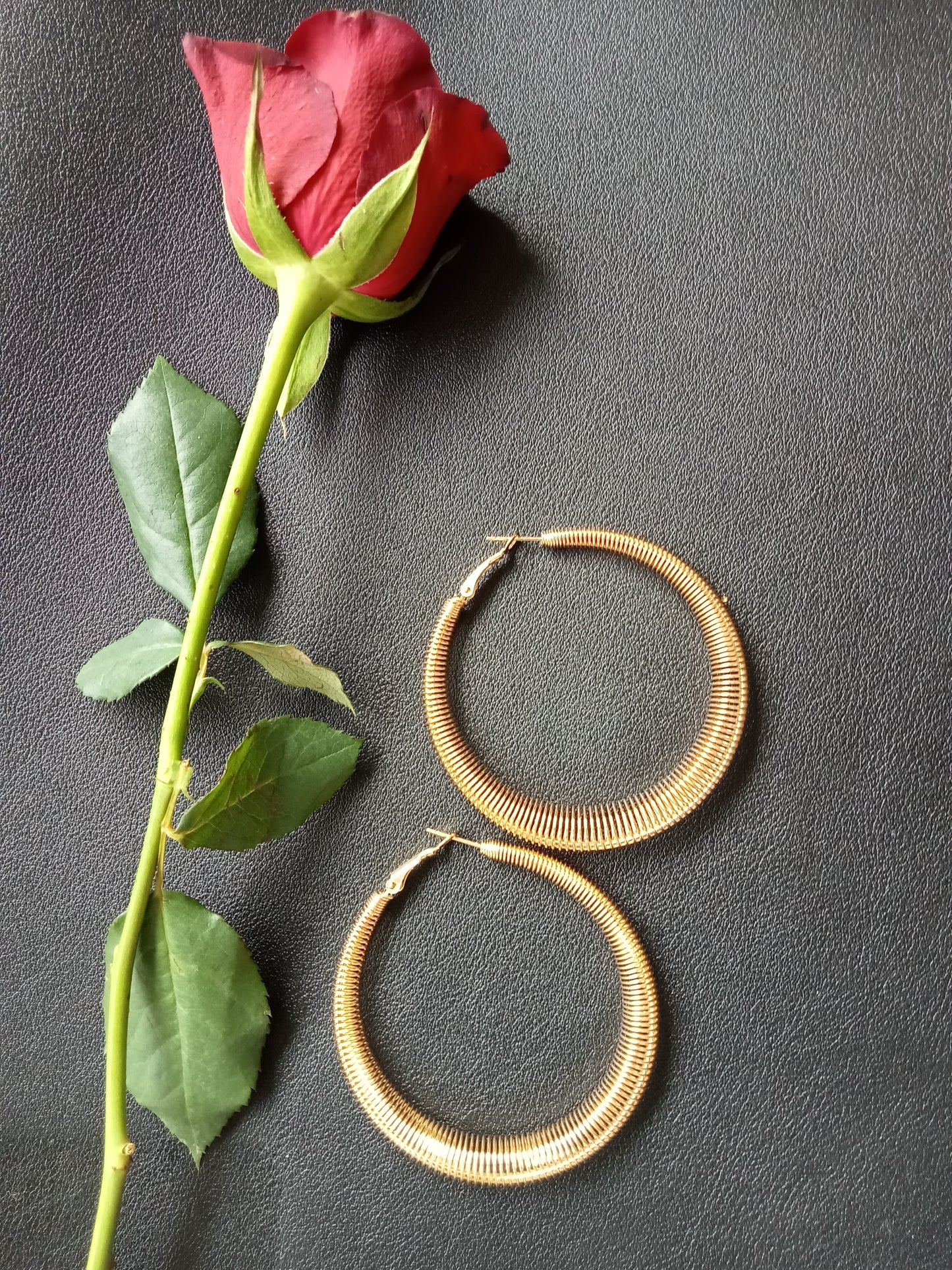 Gold Spring Tapered Hoop Earrings