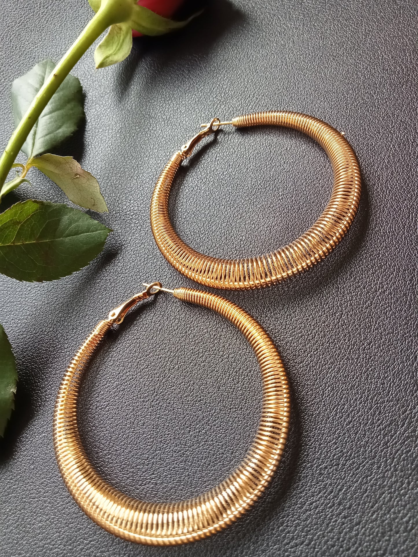 Gold Spring Tapered Hoop Earrings