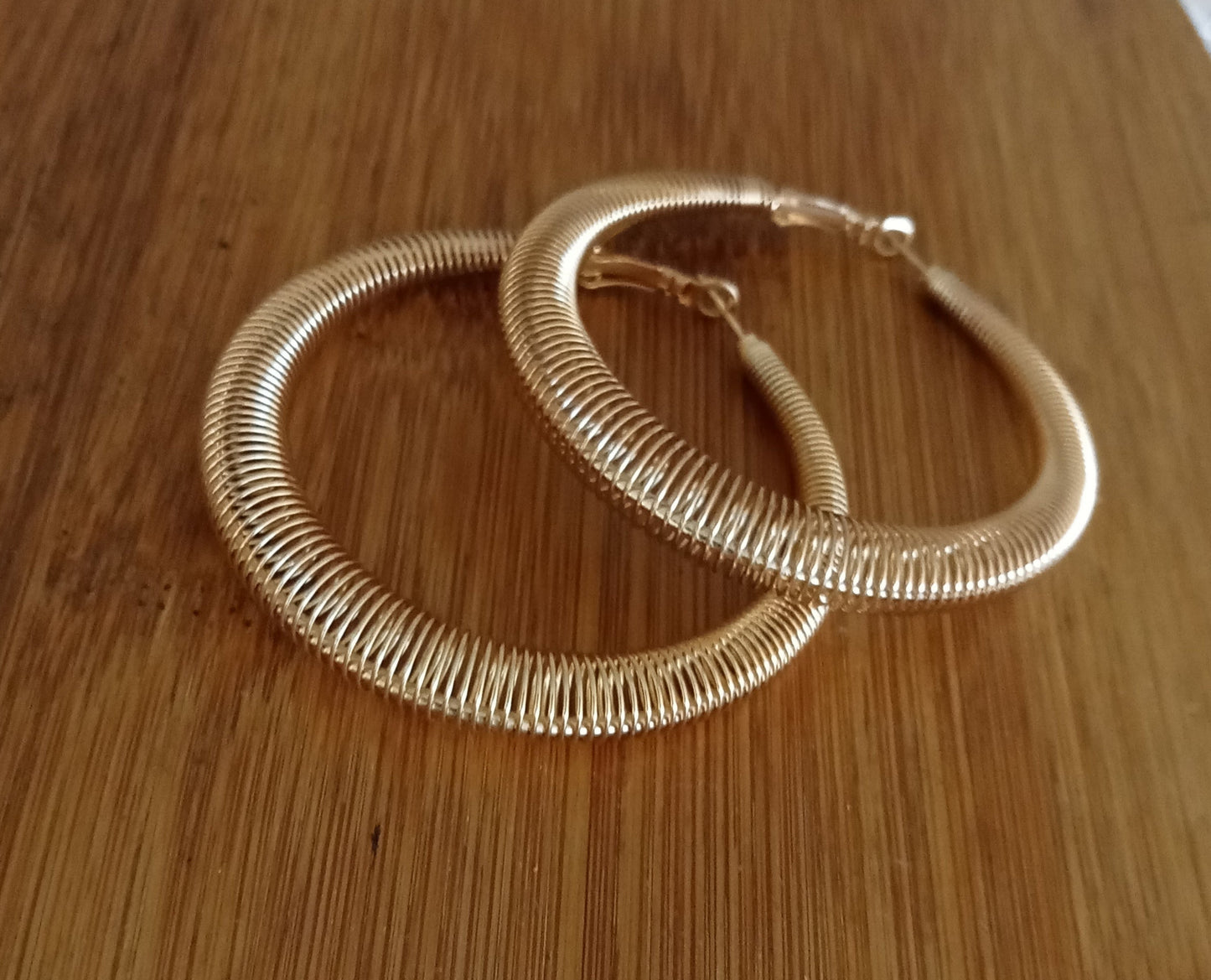 Gold Spring Tapered Hoop Earrings