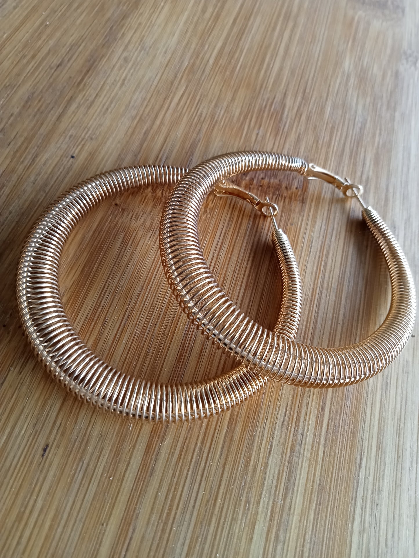 Gold Spring Tapered Hoop Earrings
